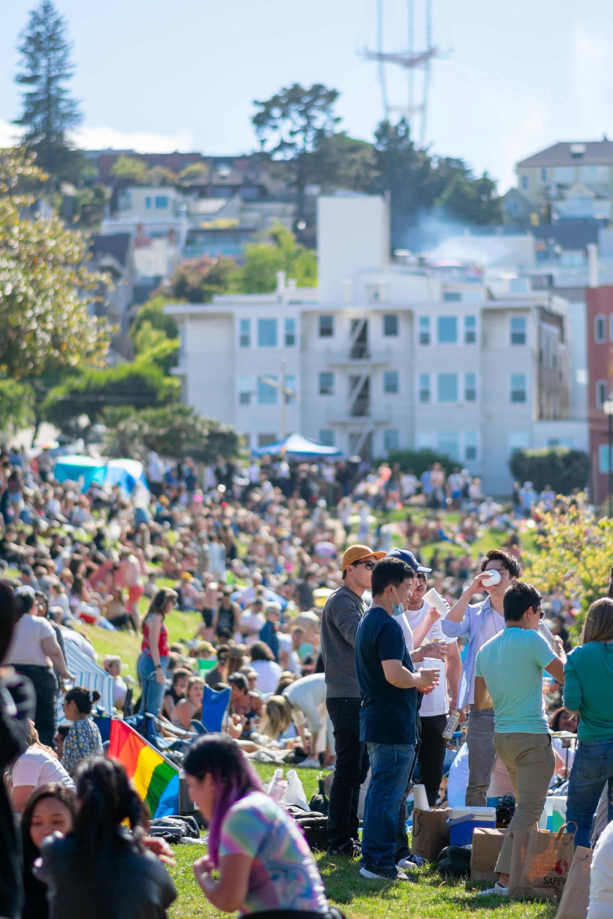 people gathering on a field during daytime